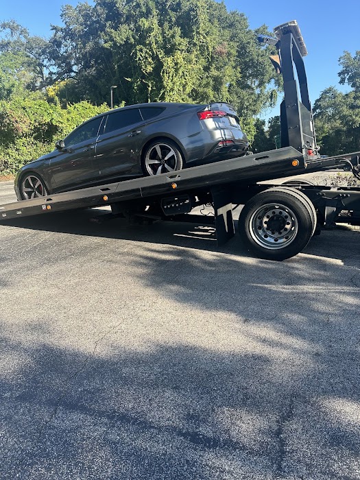 Courtesy Towing towing company near Longwood